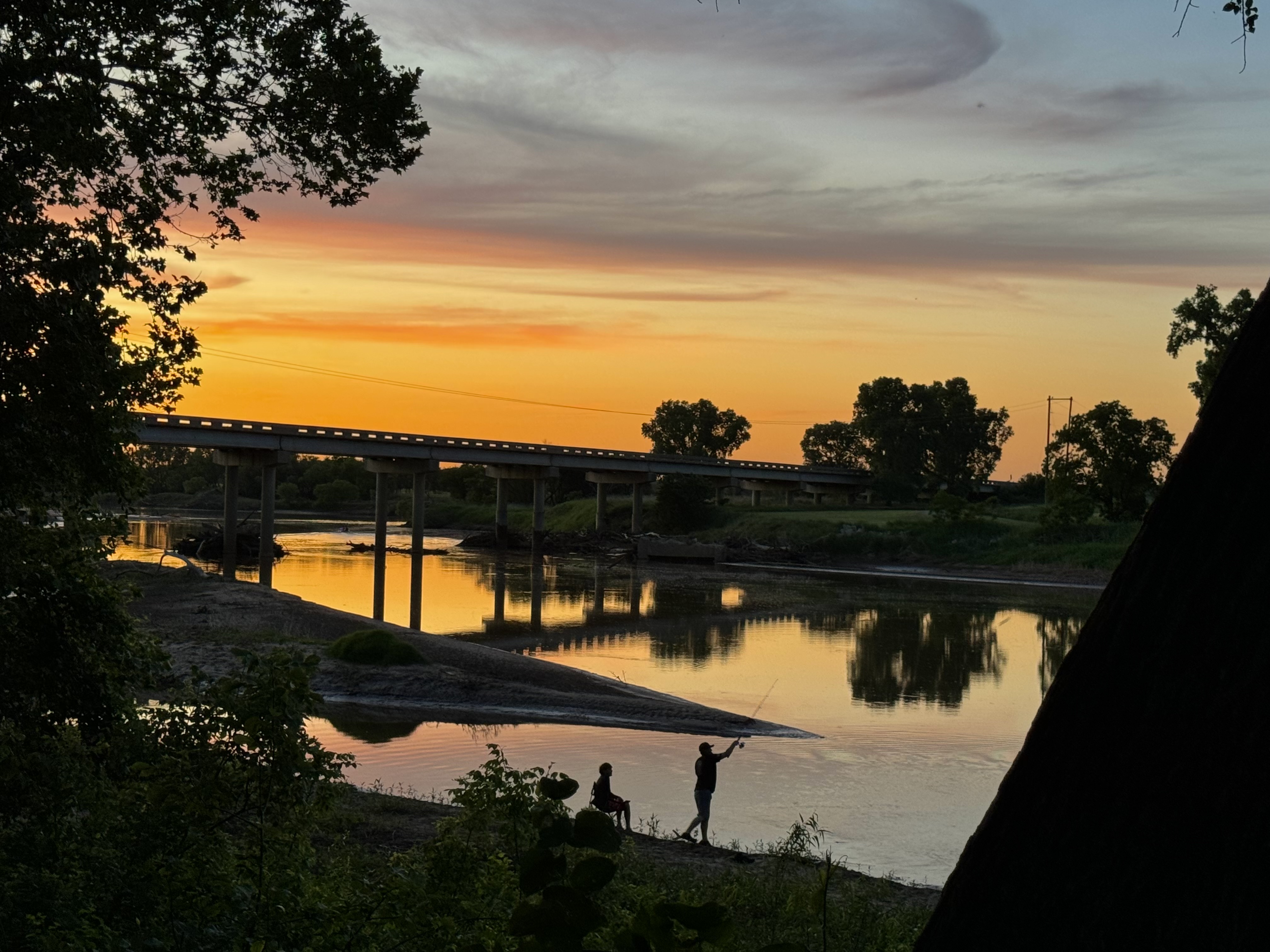 Golden sunset over the Salt Fork River at Rivershire